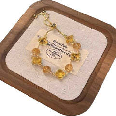 New four-leaf clover imitation blonde gold crystal four-leaf clover bracelet adjustable jewelry jewelry women's high sense INS