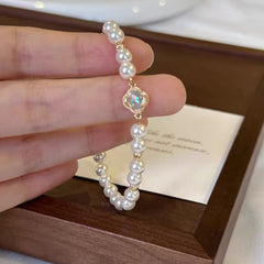 Stylish and simple lucky four-leaf clover pearl bracelet women's light luxury niche exquisite high-end beaded bracelet bracelet jewelry