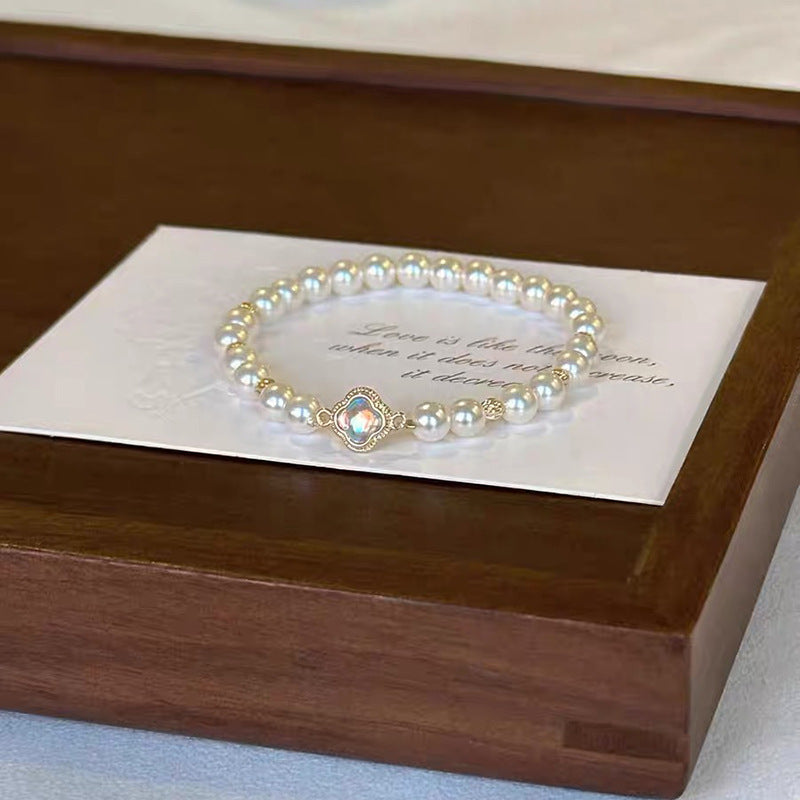 Stylish and simple lucky four-leaf clover pearl bracelet women's light luxury niche exquisite high-end beaded bracelet bracelet jewelry