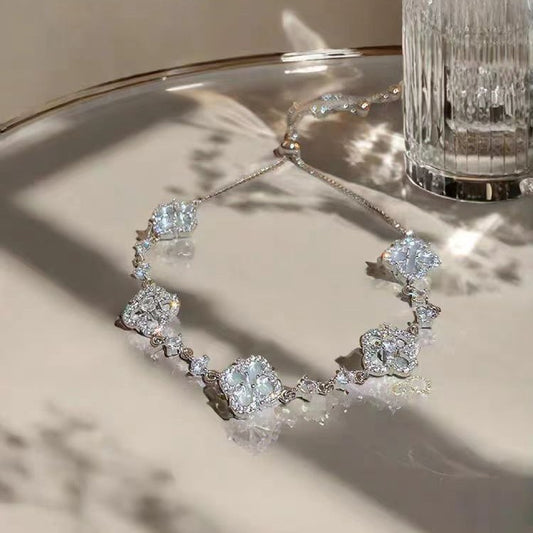 Cross-border popular new product four-petaled flower zircon flower bracelet light luxury high-end temperament bracelet adjustable women's bracelet