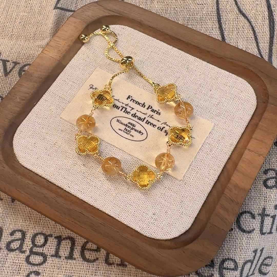 New four-leaf clover imitation blonde gold crystal four-leaf clover bracelet adjustable jewelry jewelry women's high sense INS