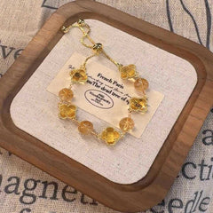 New four-leaf clover imitation blonde gold crystal four-leaf clover bracelet adjustable jewelry jewelry women's high sense INS