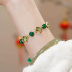 New four-leaf clover imitation blonde gold crystal four-leaf clover bracelet adjustable jewelry jewelry women's high sense INS